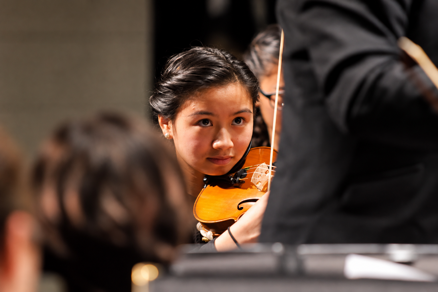 Student soloist performing with orchestra